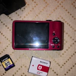 Sony Cyber-shot 16.1 MP Compact Camera with battery + charger + 8GB SD card